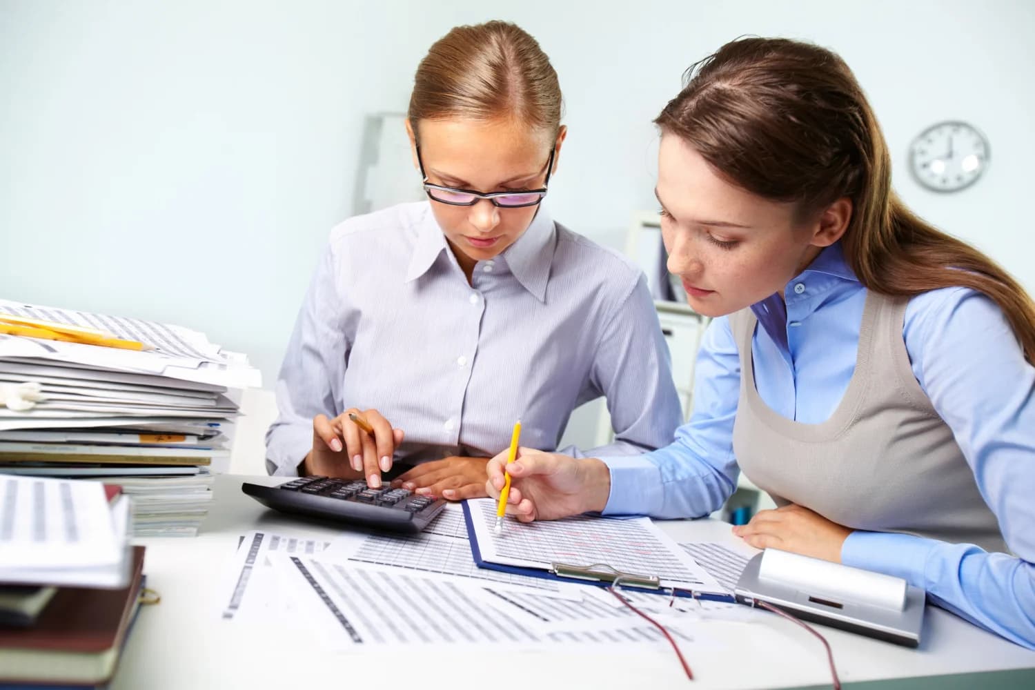 Marketing for accountants in Calgary — a CPA reviewing financials at a desk in a Calgary accounting firm.